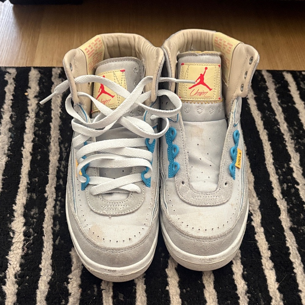 Jordan Kids High-Top Sneakers in Light Gray with Blue Accents and Red Logo